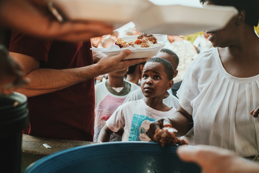 Volunteers serving food to the community together